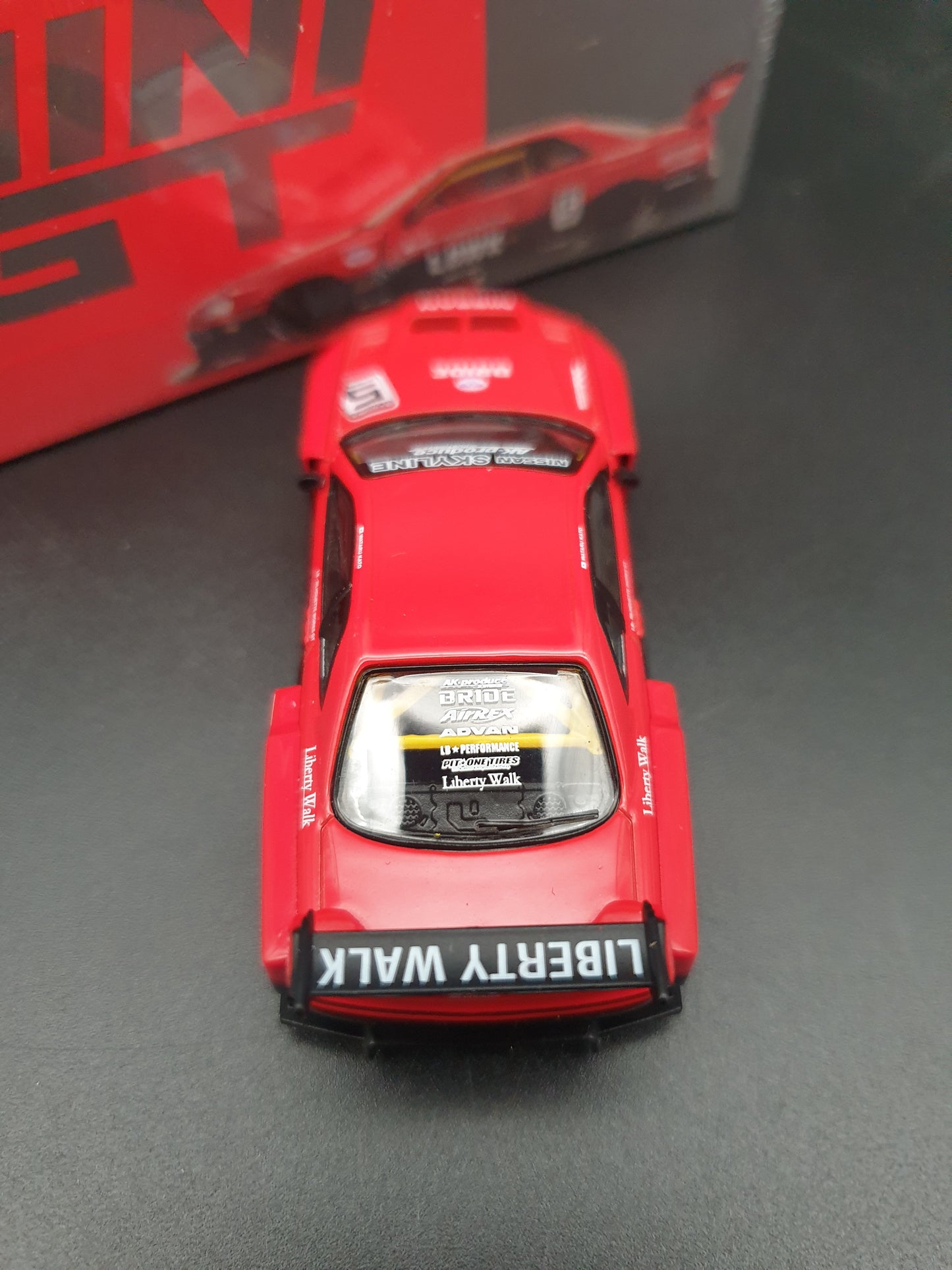 Nissan LB-ER34 Super Silhouette Skyline LBWK Red/Black Mini GT 1:64