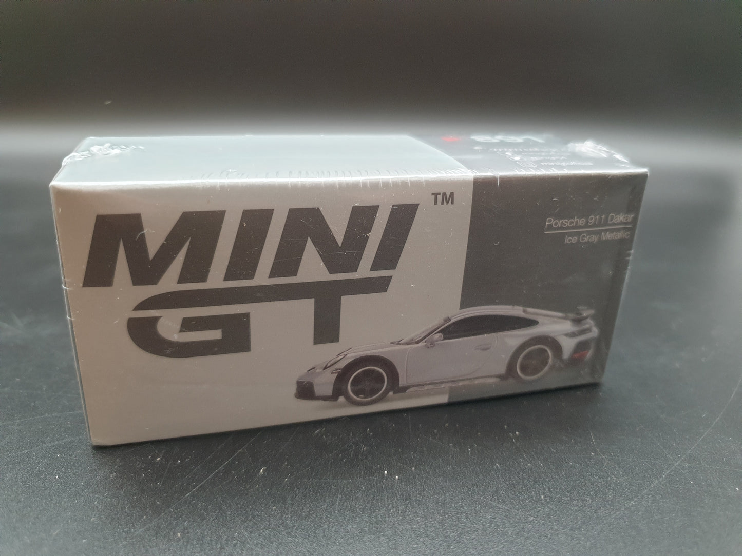 Porsche 911 Dakar Ice Gray Metallic Mini GT 1:64