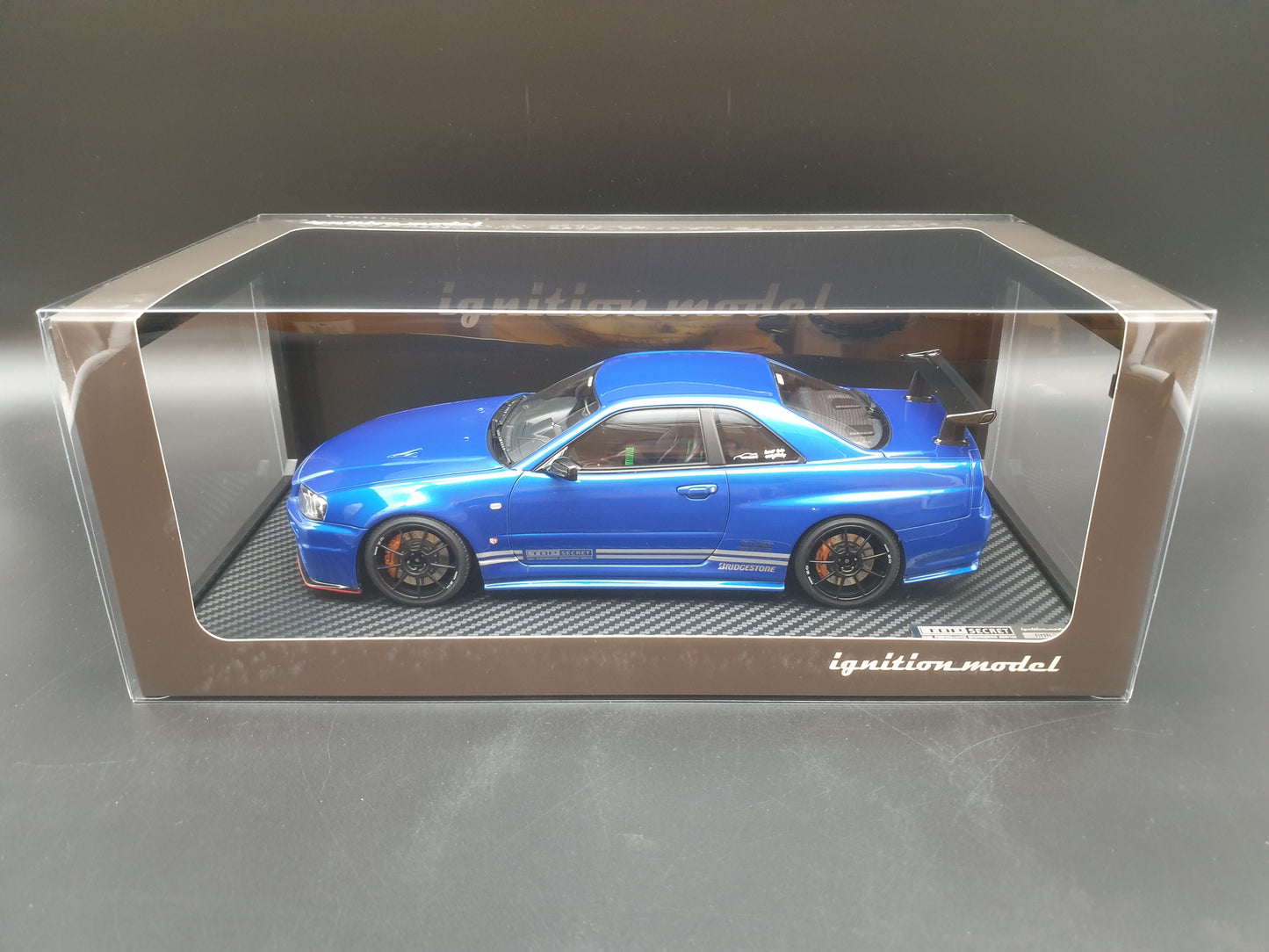 IG3641 TOP SECRET 34GT-R (BNR34) Bayside Blue Ignition Model 1:18