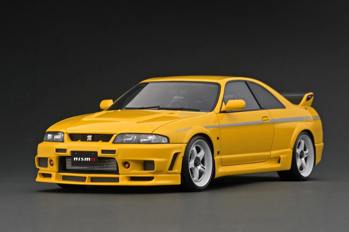 IG3658 NISMO 400R (BCNR33) Yellow Ignition Model 1:18