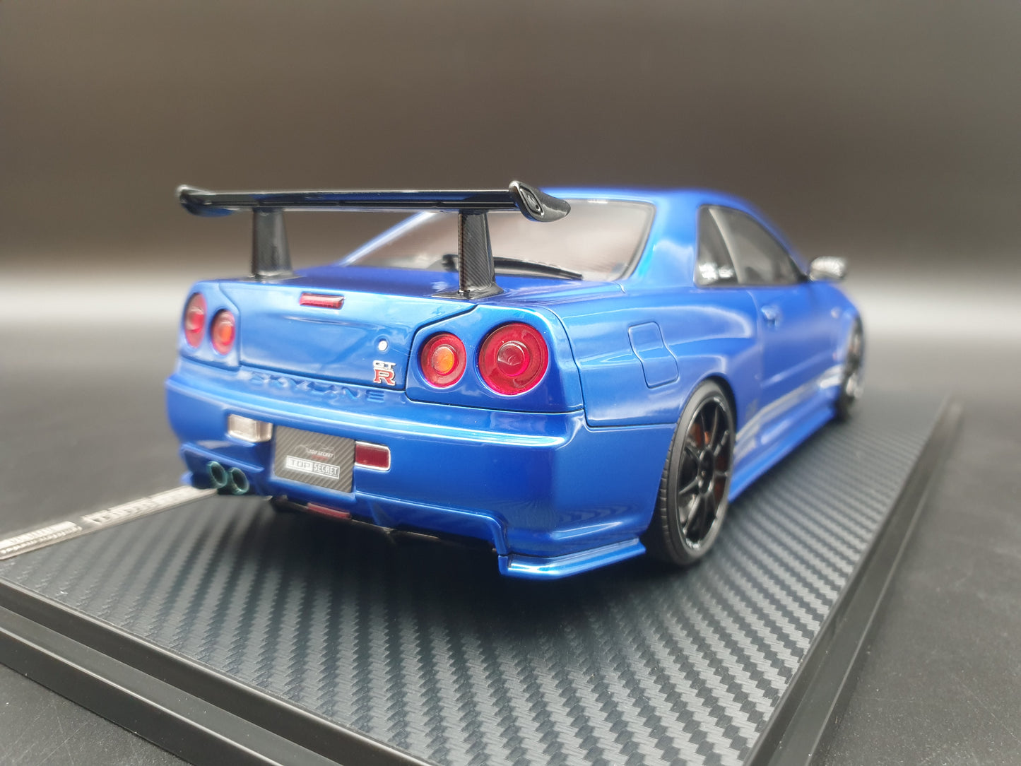IG3641 TOP SECRET 34GT-R (BNR34) Bayside Blue Ignition Model 1:18