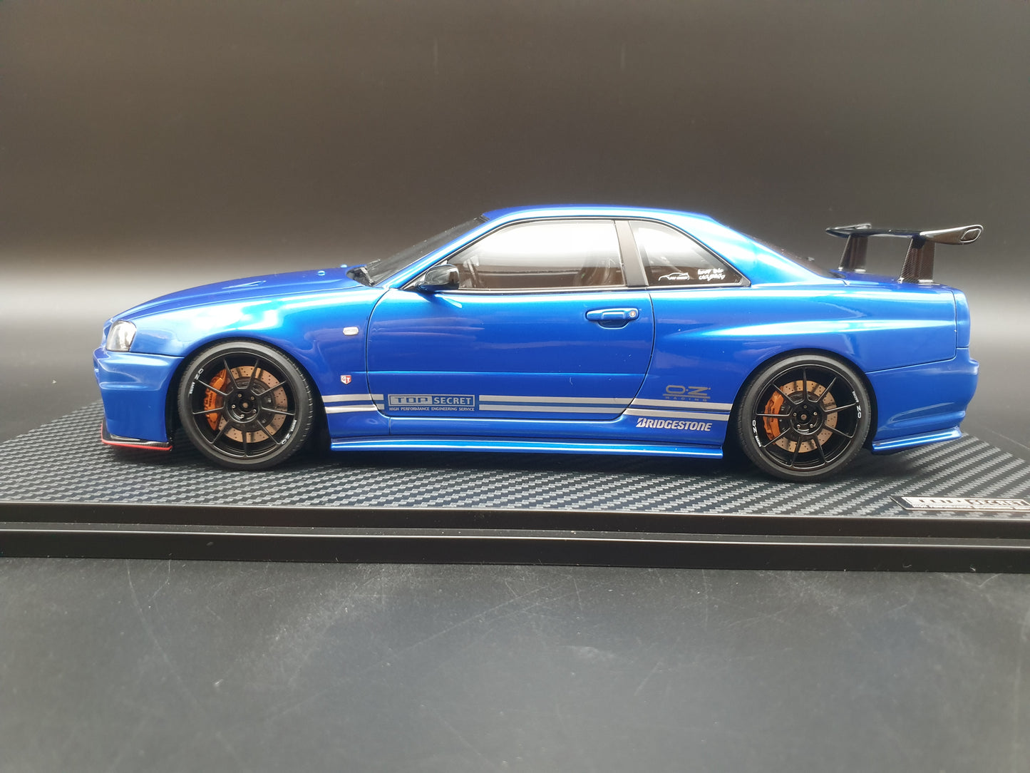 IG3641 TOP SECRET 34GT-R (BNR34) Bayside Blue Ignition Model 1:18